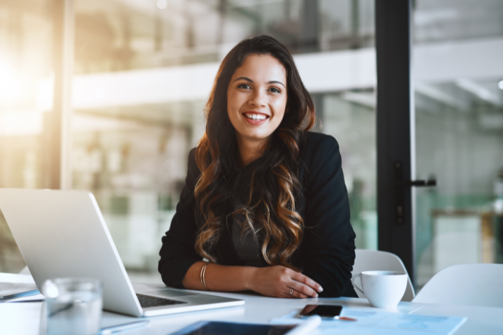 Women at desk in office.